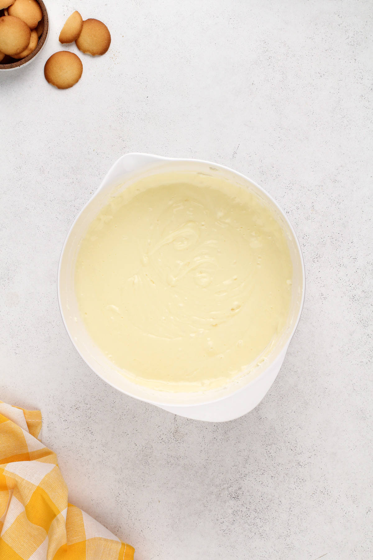 Cheesecake filling base in a white bowl.