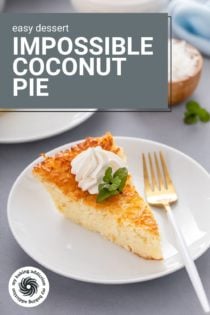 Slice of impossible coconut pie next to a fork on a white plate, garnished with mint and whipped cream. Text overlay includes recipe name.
