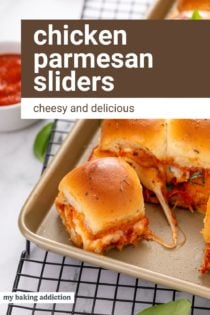 Chicken parmesan slider cut from the pan of sliders and being pulled away. Text overlay includes recipe name.