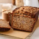 Sliced loaf of oatmeal banana bread.