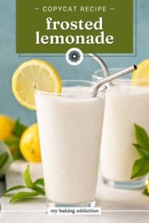 Close up of a glass of frosted lemonade on a marble countertop. Text overlay includes recipe name.