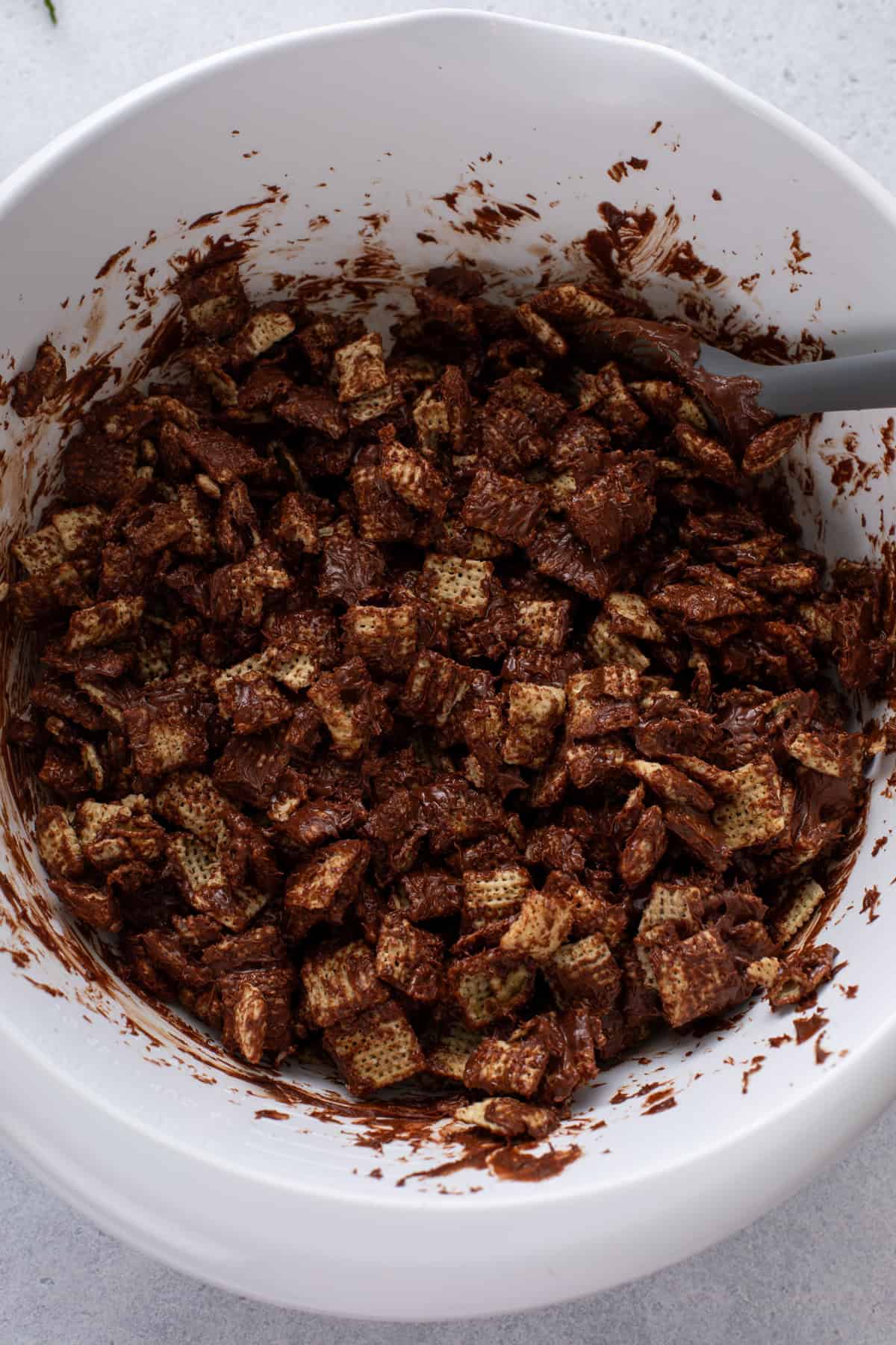 Chex cereal coated in melted chocolate mixture.