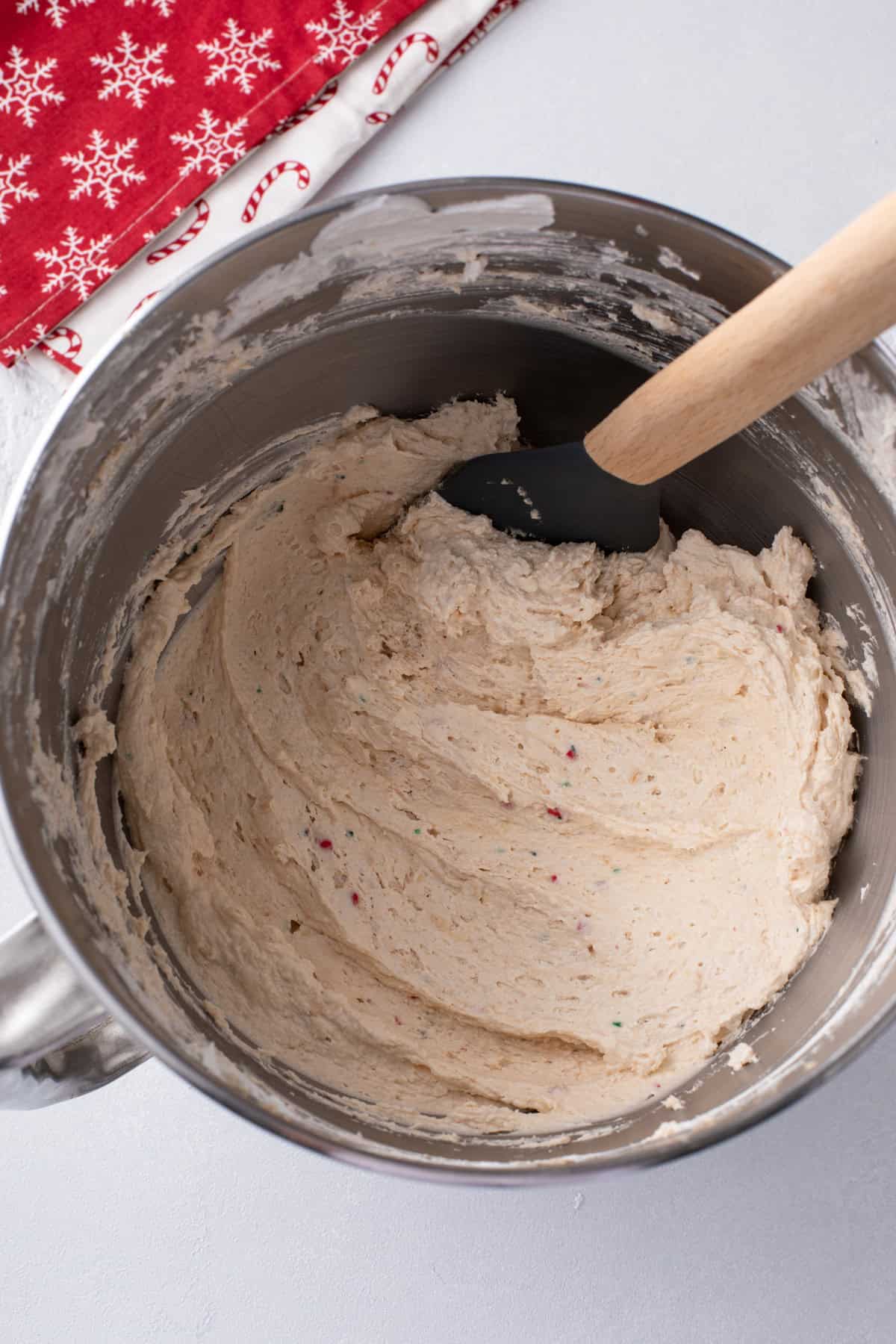 Little debbie christmas tree cake dip mixed in a mixing bowl.