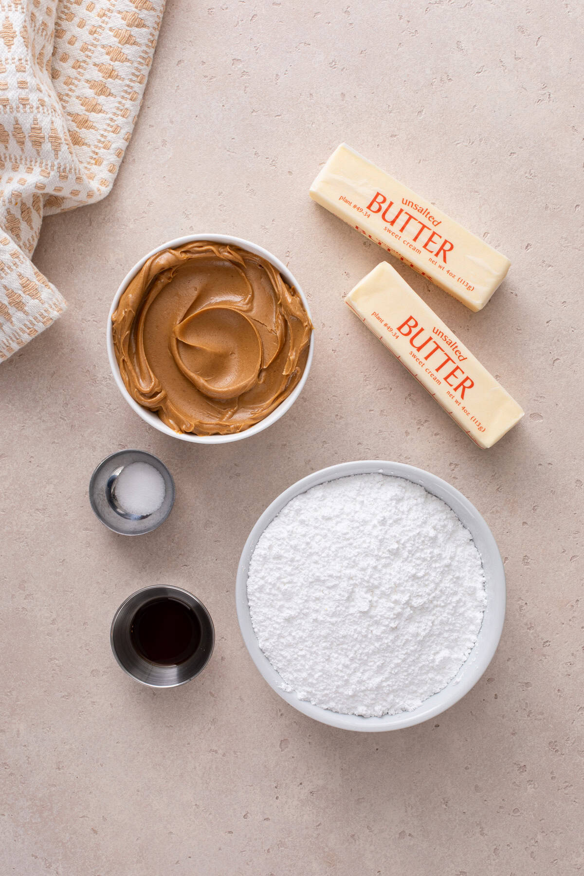 Easy peanut butter fudge ingredients arranged on a countertop.