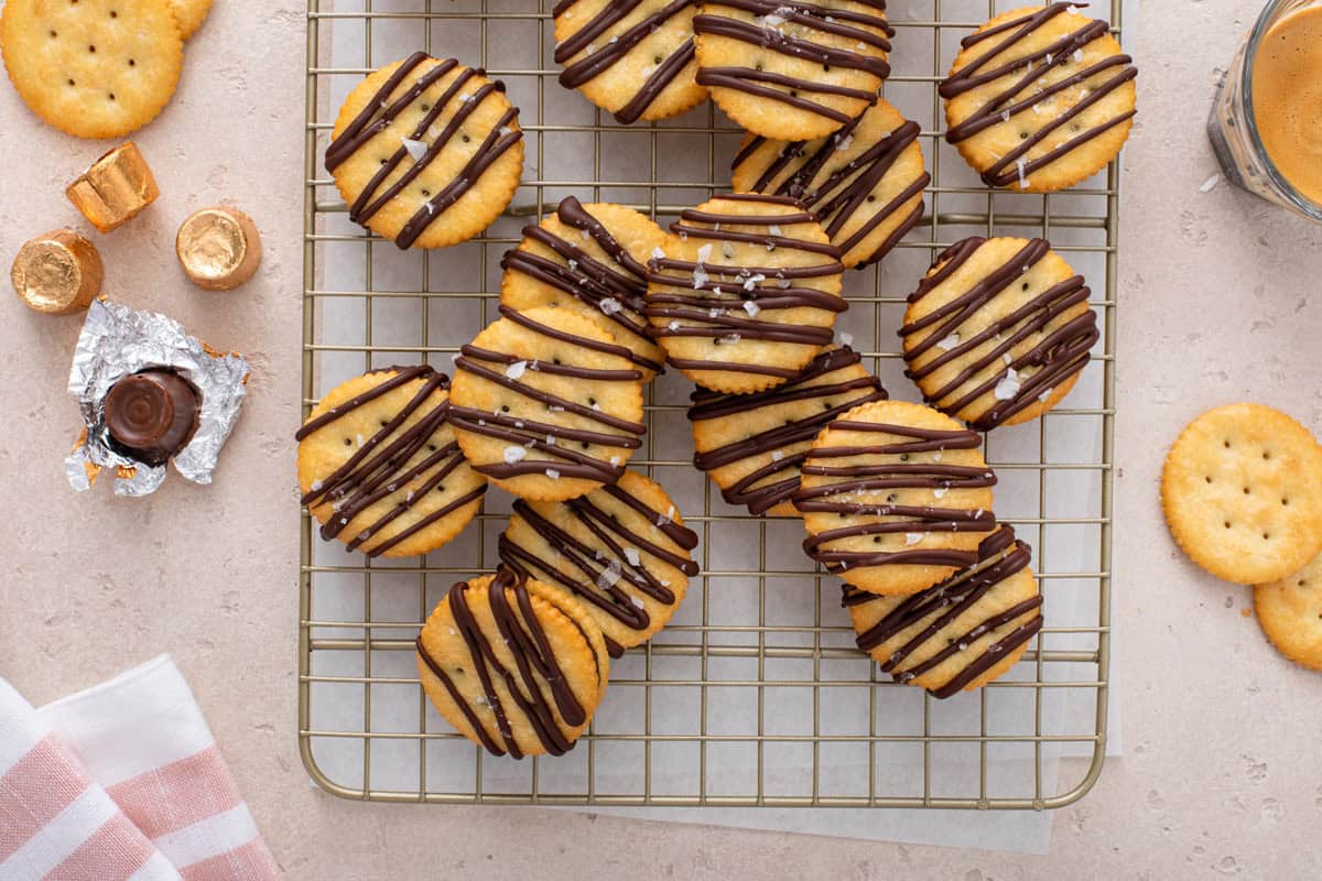 Overhead view of rolo ritz cracker cookies arranged on a wire rack.