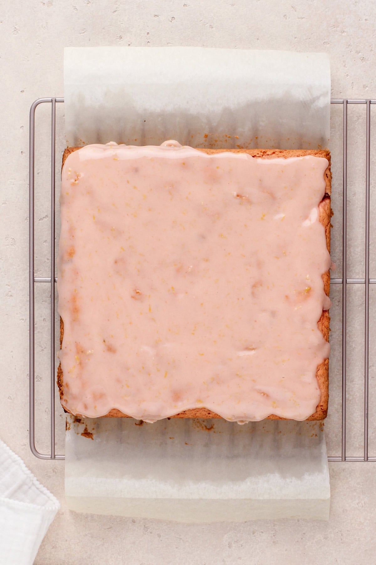 Strawberry brownies topped with strawberry glaze.