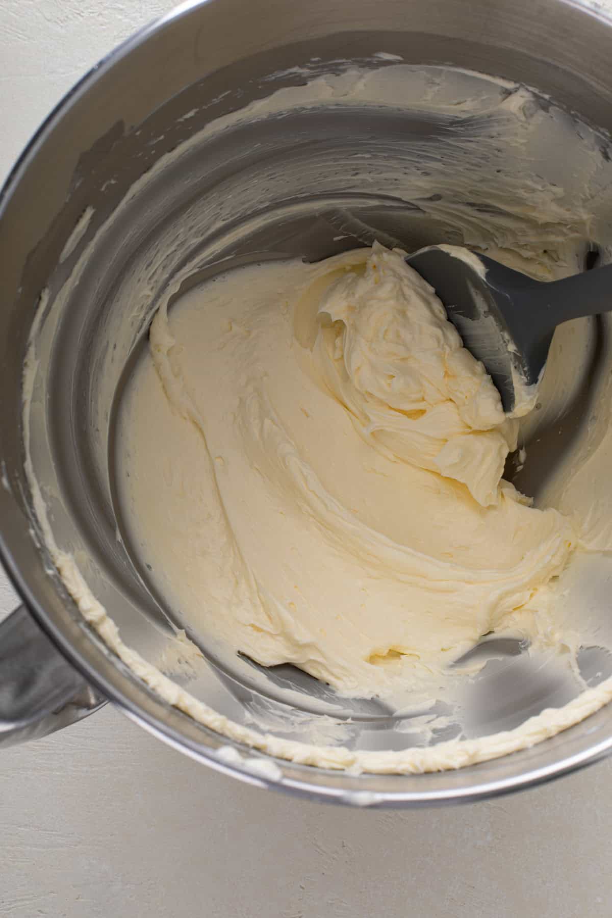 Butter beaten in the bowl of a stand mixer.