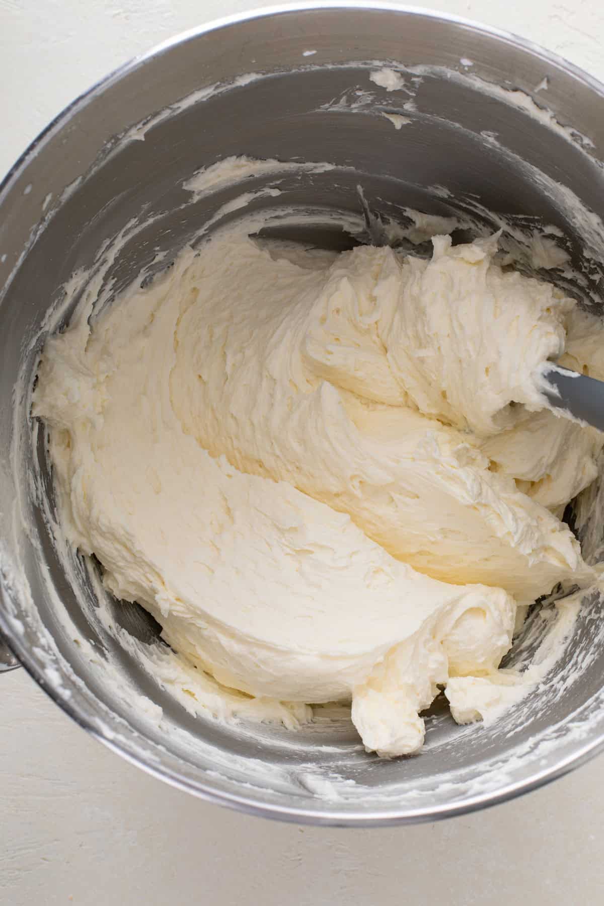 Well beaten sugar cookie frosting that is super light and fluffy.