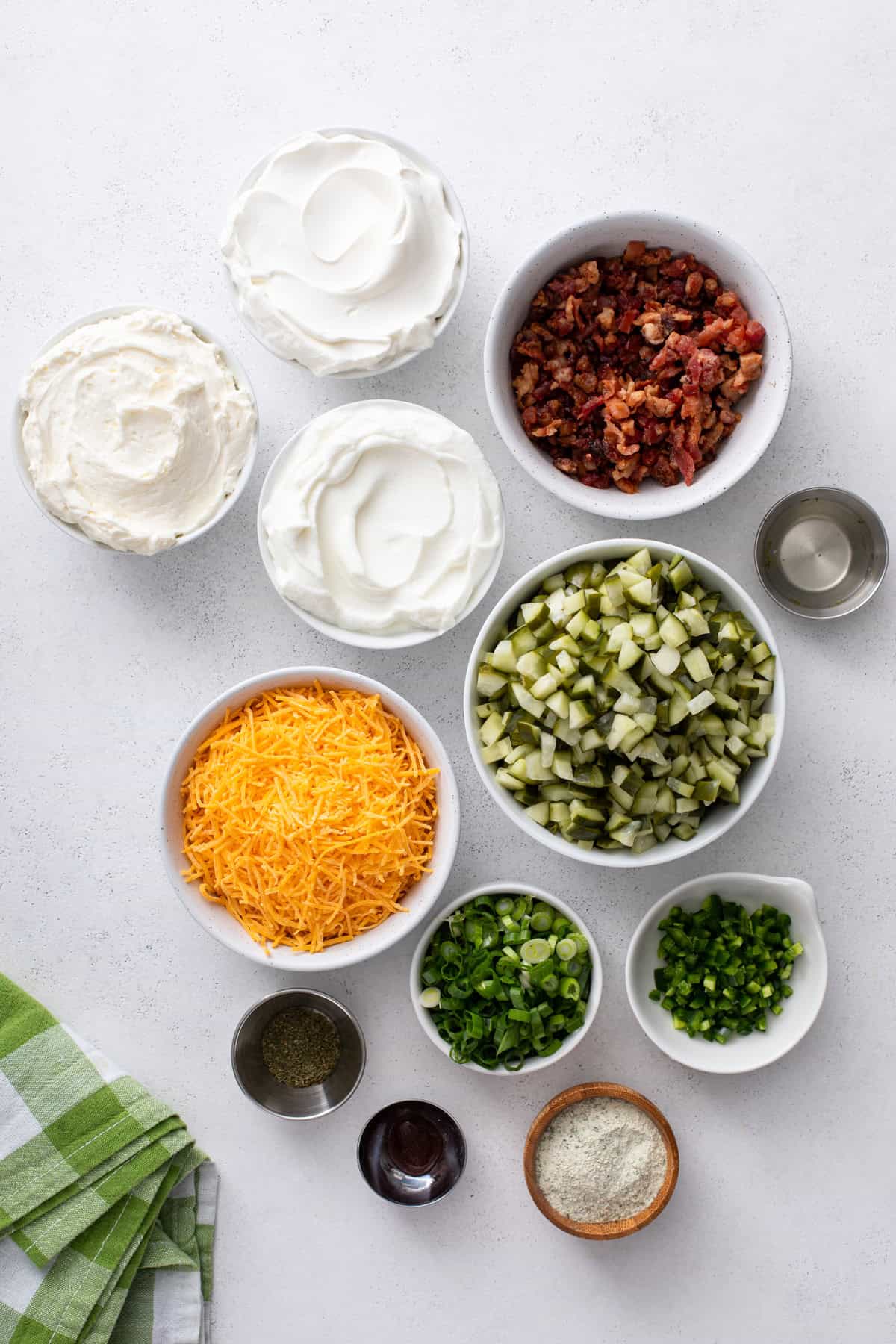 Grillo's pickle dip ingredients arranged on a countertop.