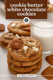 Four cookie butter cookies stacked in front of a glass of milk. Text overlay includes recipe name.