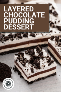 Layered chocolate pudding dessert removed from the pan, with slices cut from it. Text overlay includes recipe name.