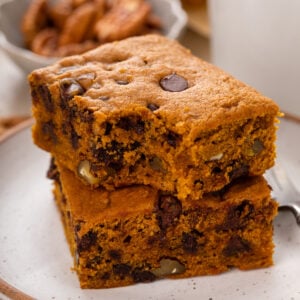 Bite from a slice of pumpkin chocolate chip snack cake.