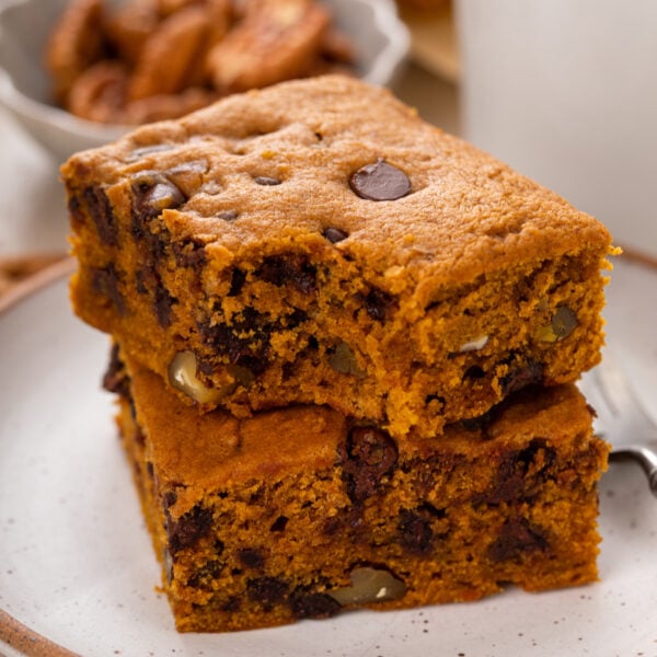 Bite from a slice of pumpkin chocolate chip snack cake.