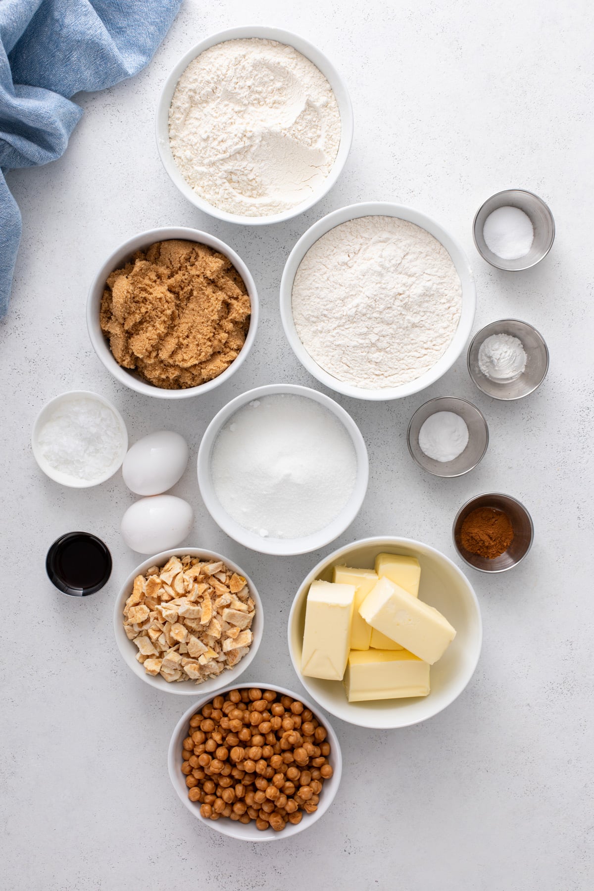 Ingredients for caramel apple cookies arranged on a countertop.