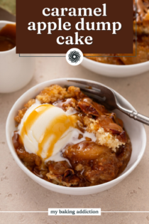 Fork in a bowl of caramel apple dump cake topped with a scoop of vanilla ice cream and caramel sauce. Text overlay includes recipe name.
