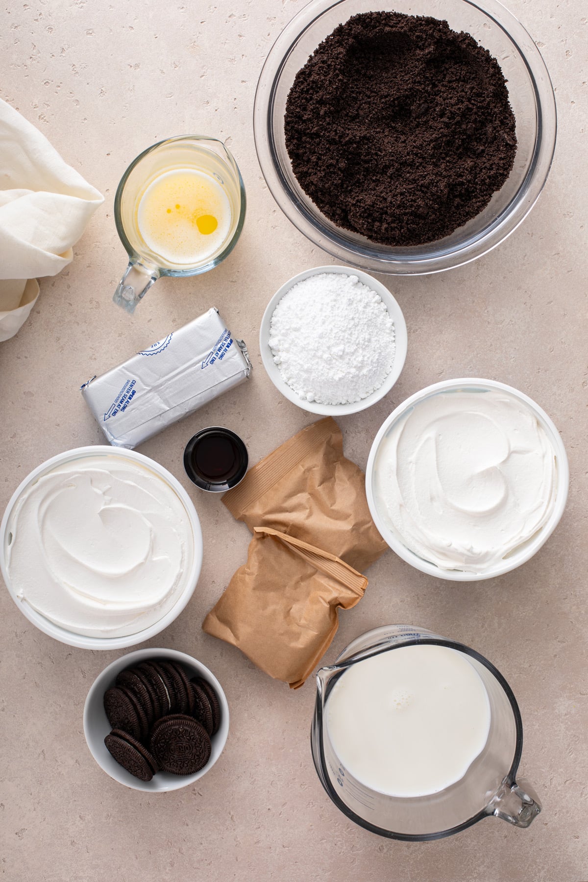 Ingredients for chocolate pudding dessert arranged on a countertop.