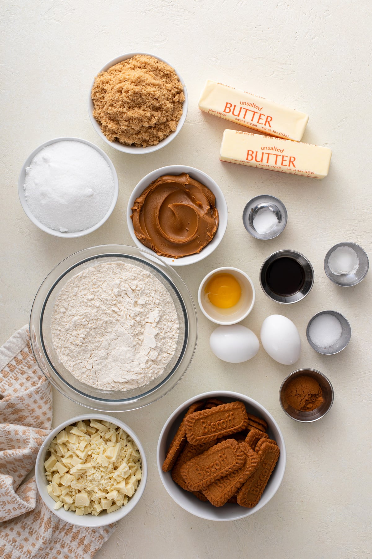 Ingredients for cookie butter cookies arranged on a countertop.