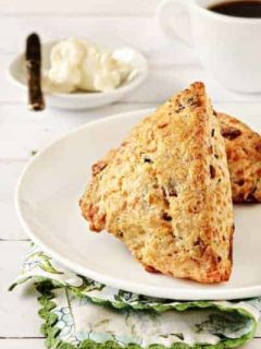 Two bacon chocolate scones on a plate