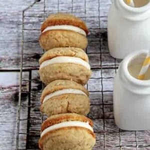 A row of banana Whoopie pies on a cooling rack