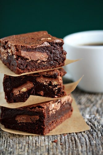 Stack of Symphony brownies on a wood surface